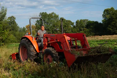 Vicente Gonzalez moves his tractor at his farm in Bodcaw, Ark. on Sept. 7, 2023. Photo by Rory Doyle.